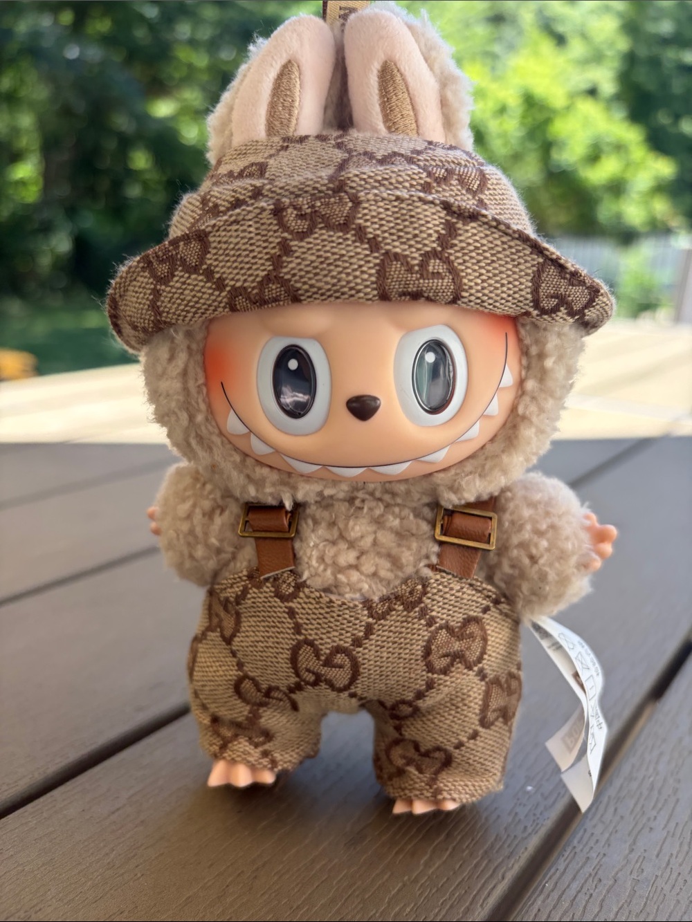 Exciting Macaroon Labubu in Toffee with designer overalls and bucket hat